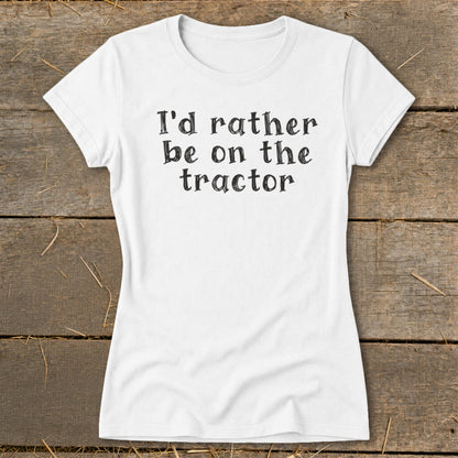 White t-shirt with black text "I'd rather be on the tractor."