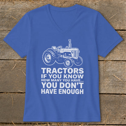 Blue v-neck shirt with white tractor graphic and text: Tractors if you know how many you have... you don't have enough.