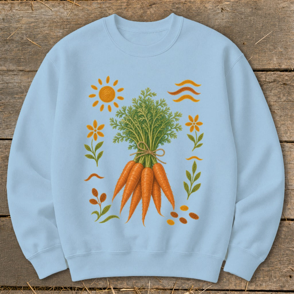 Light blue sweatshirt with a graphic of a bunch of carrots surrounded by sun and floral elements.