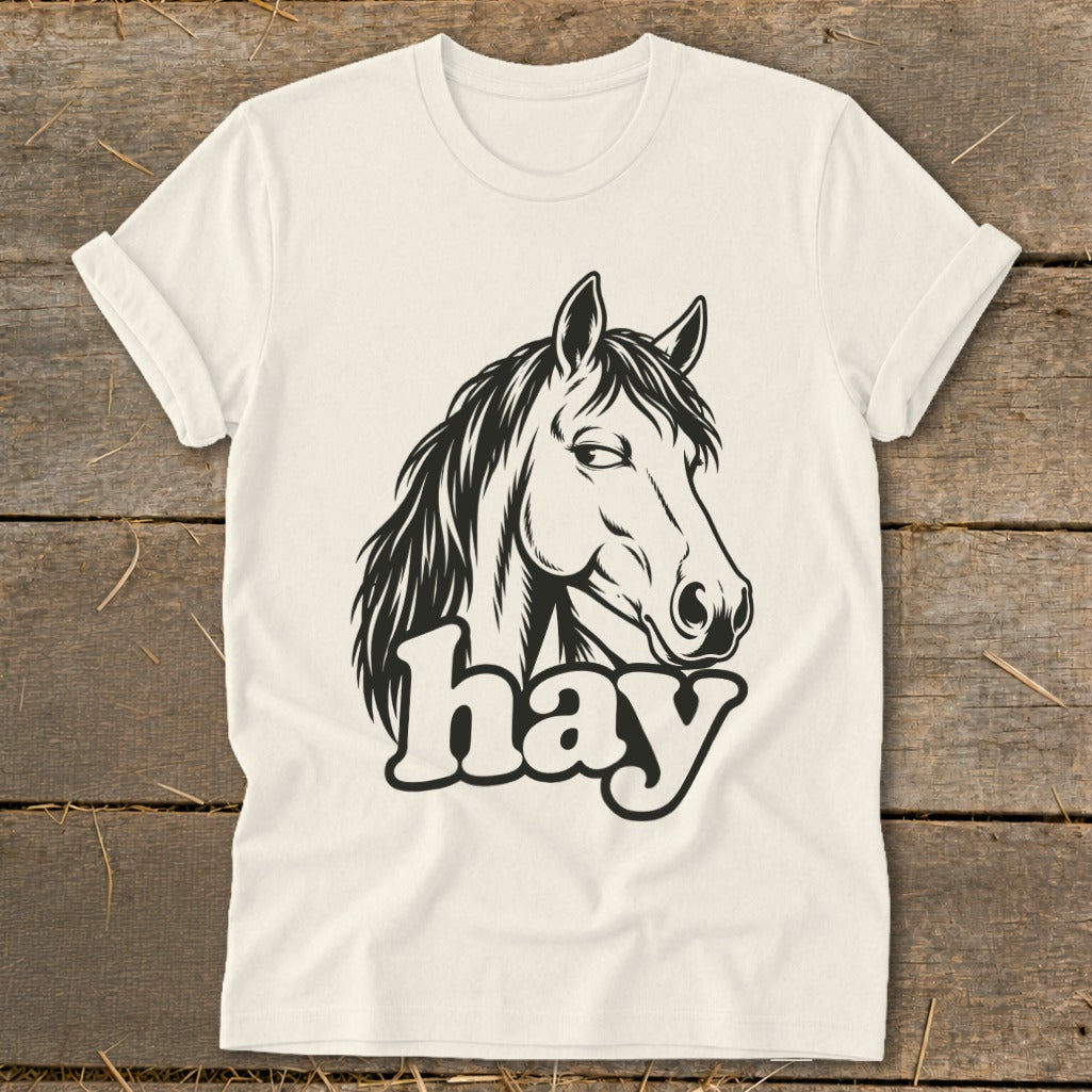 Cream t-shirt with a black line drawing of a horse's head and the word "hay".