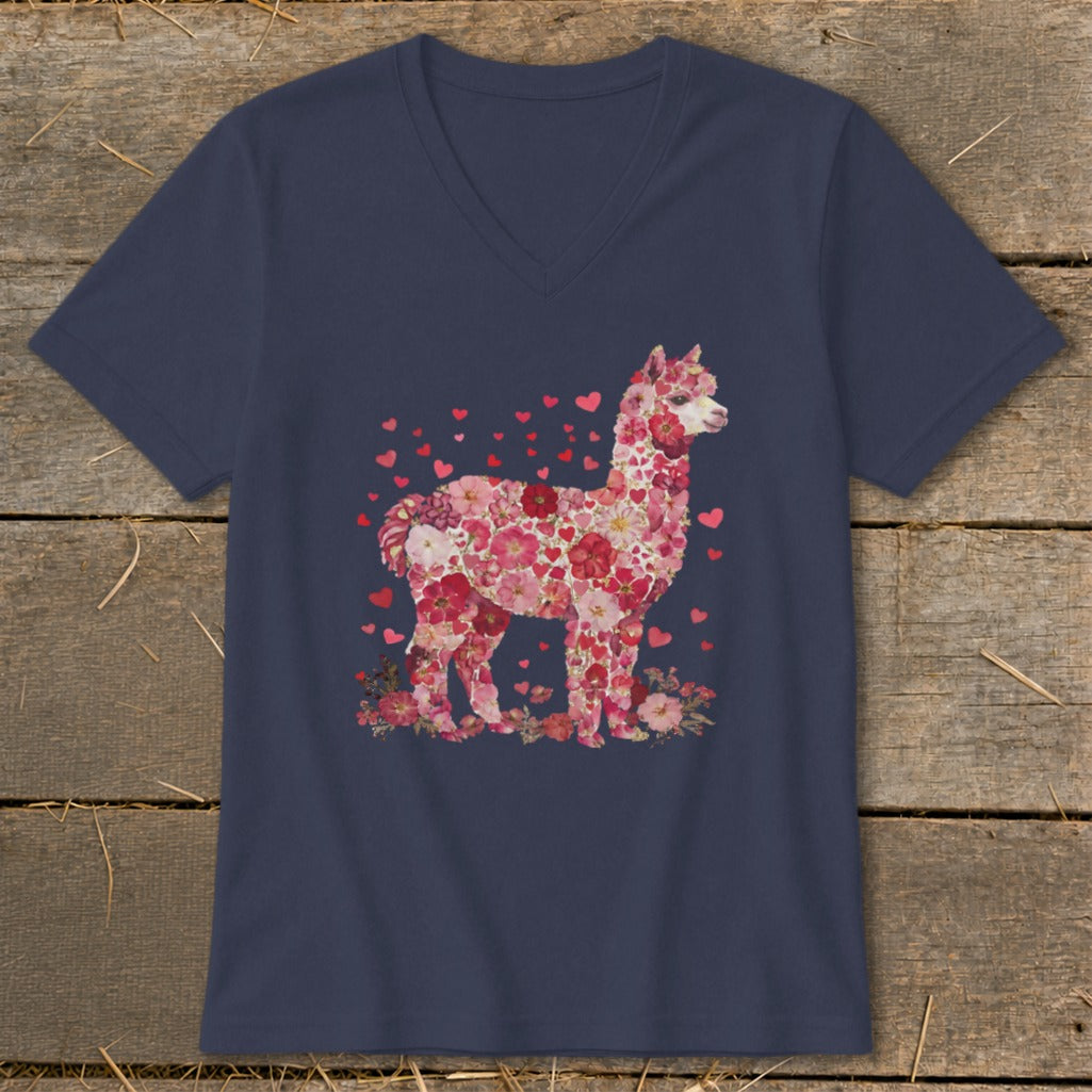 Navy v-neck t-shirt with a pink floral alpaca graphic and scattered hearts.