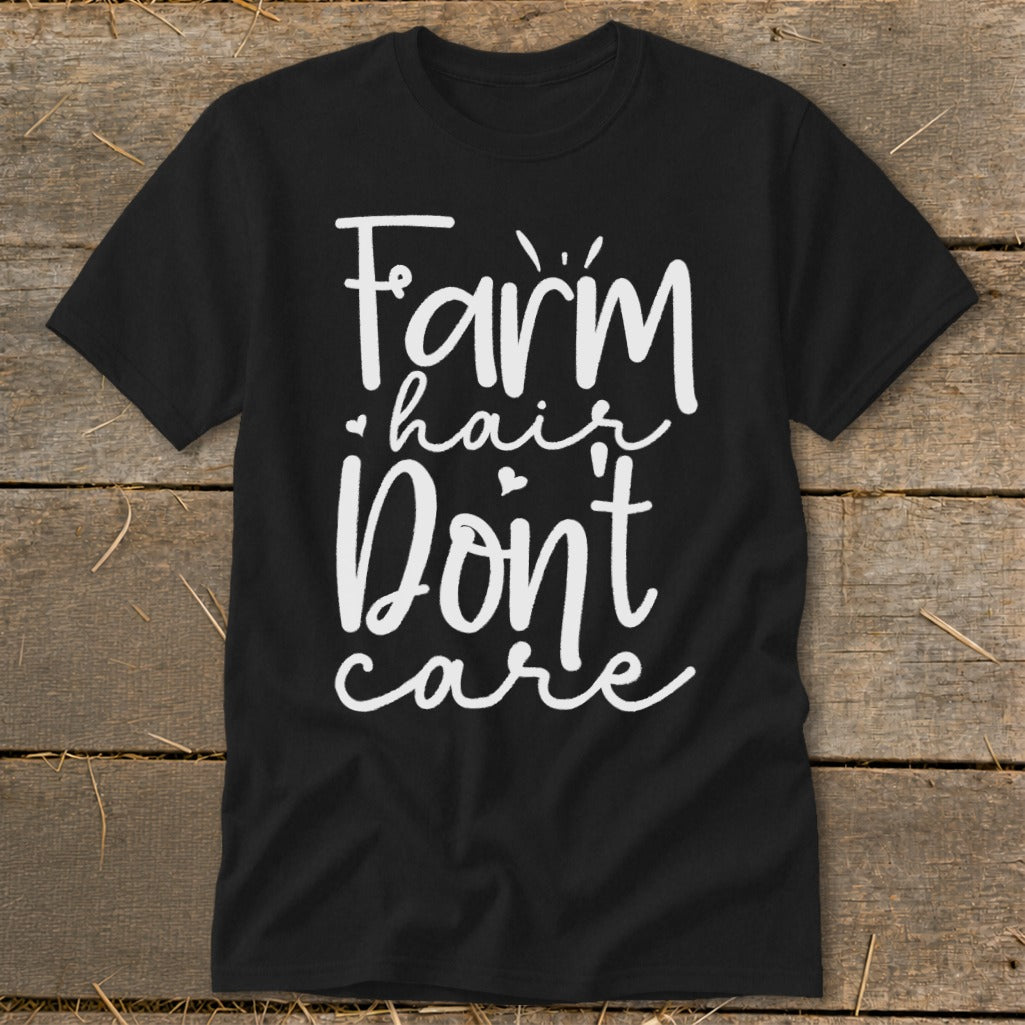 Black t-shirt with "Farm hair Don't care" in white script lettering.