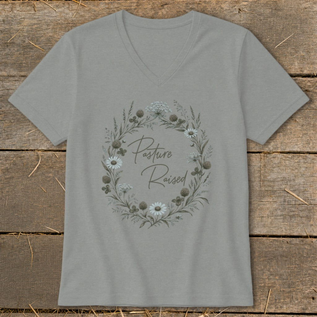 Grey v-neck t-shirt with floral wreath and "Pasture Raised" text.
