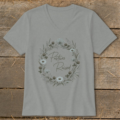 Grey v-neck t-shirt with floral wreath and "Pasture Raised" text.