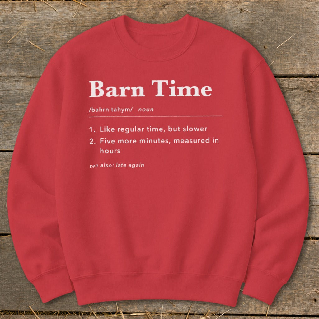 Red sweatshirt with white text defining "Barn Time" as like regular time but slower.
