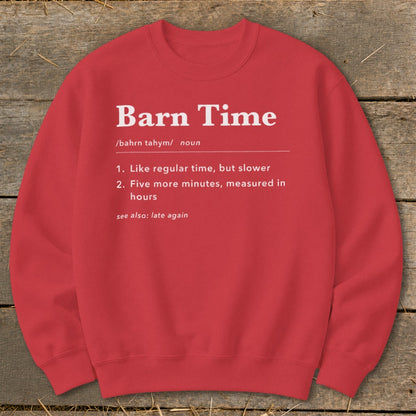Red sweatshirt with white text defining "Barn Time" as like regular time but slower.