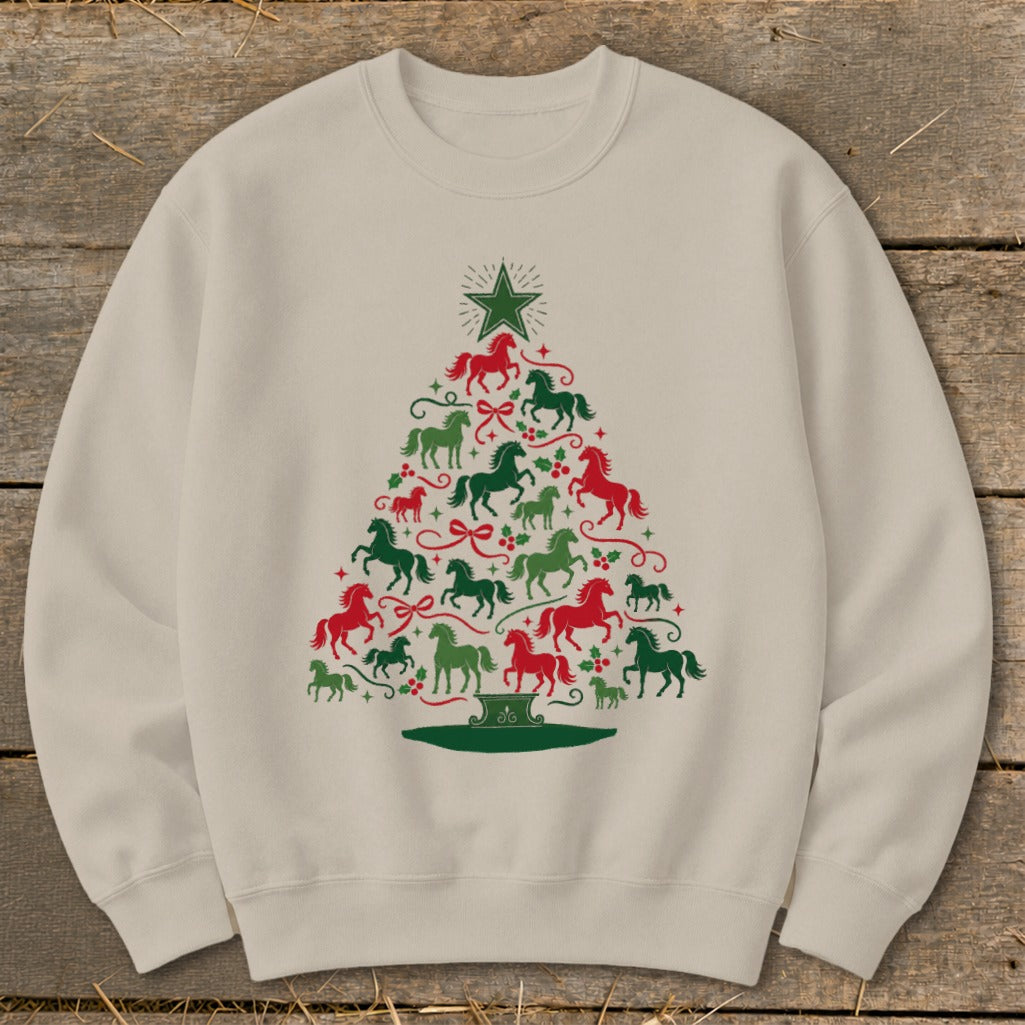 Light tan sweatshirt with a Christmas tree made of red and green horses and holly.