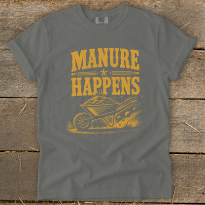 Grey t-shirt with "MANURE HAPPENS" text and wheelbarrow graphic in yellow.