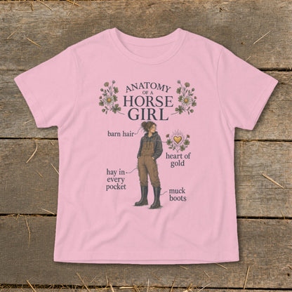 Pink t-shirt with "Anatomy of a Horse Girl" graphic and descriptive labels.