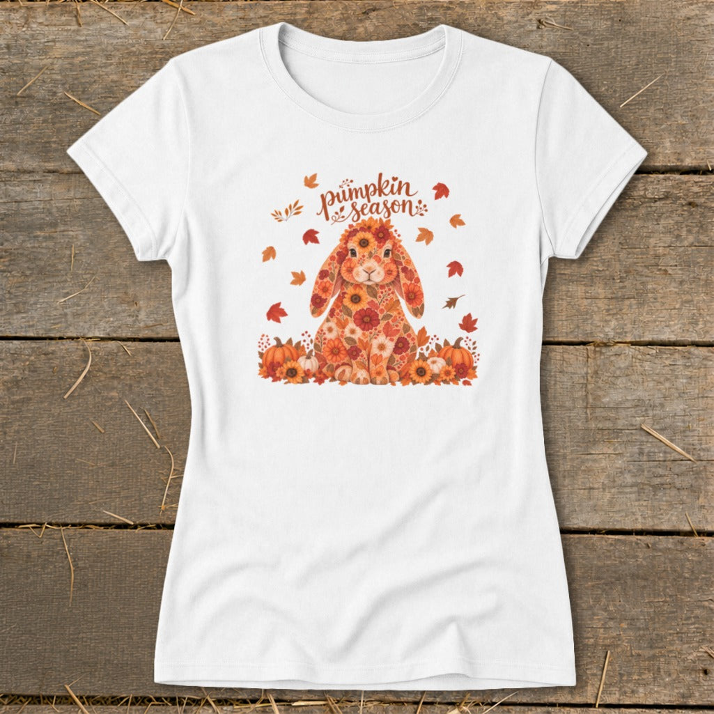 White t-shirt with floral rabbit and "pumpkin season" text with autumn leaves.