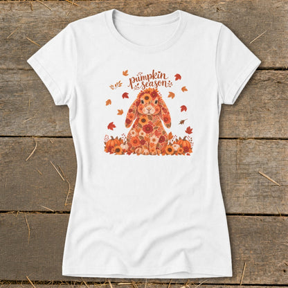White t-shirt with floral rabbit and "pumpkin season" text with autumn leaves.