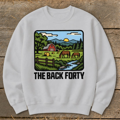 Light gray crewneck sweatshirt featuring a graphic of a rural farm scene and the text THE BACK FORTY.