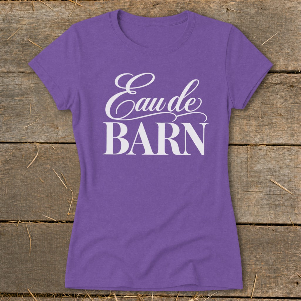 Purple t-shirt with white text reading "Eau de BARN".