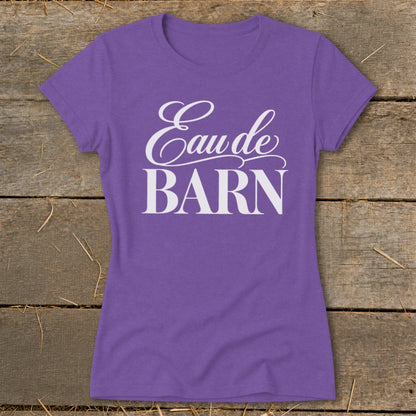 Purple t-shirt with white text reading "Eau de BARN".