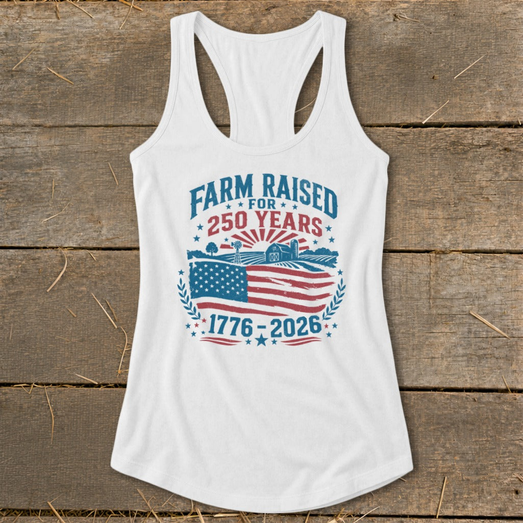 White tank top with "Farm Raised for 250 Years 1776-2026" text and American flag graphic.