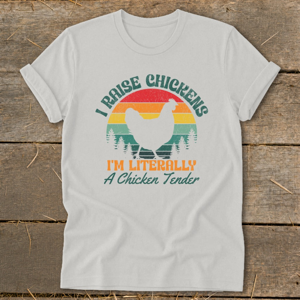 White t-shirt with "I RAISE CHICKENS" and "I'M LITERALLY A Chicken Tender" text.