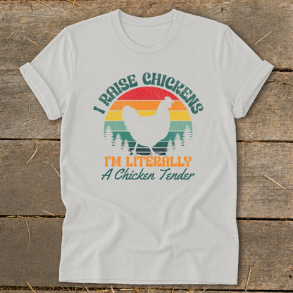 White t-shirt with "I RAISE CHICKENS" and "I'M LITERALLY A Chicken Tender" text.