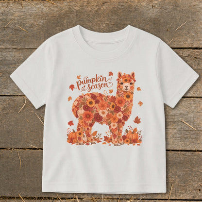 White t-shirt with a floral alpaca graphic and "pumpkin season" text.