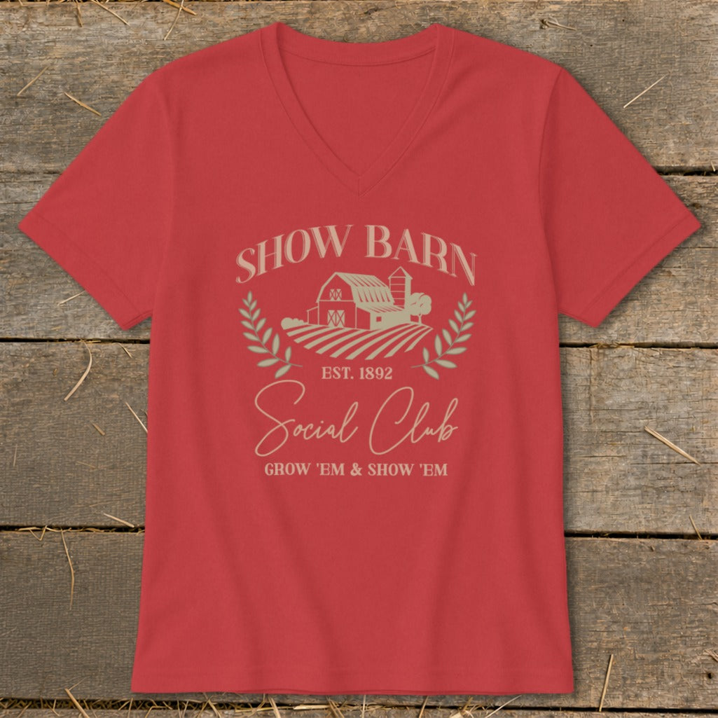 Red v-neck t-shirt with Show Barn Social Club graphic and "GROW 'EM & SHOW 'EM" text.