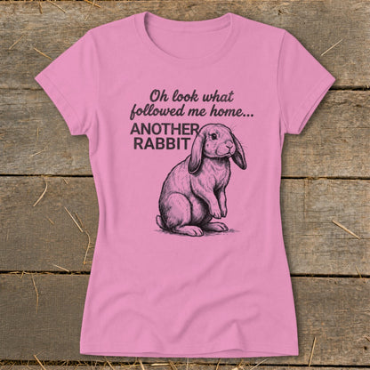 Pink t-shirt with drawing of a lop-eared rabbit and text "Oh look what followed me home... ANOTHER RABBIT".