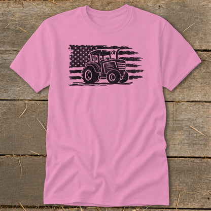 Pink t-shirt with a distressed tractor superimposed on an American flag.
