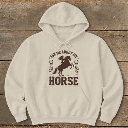 Beige hoodie with brown graphic: "Ask Me About My Horse" and a horse rider silhouette.