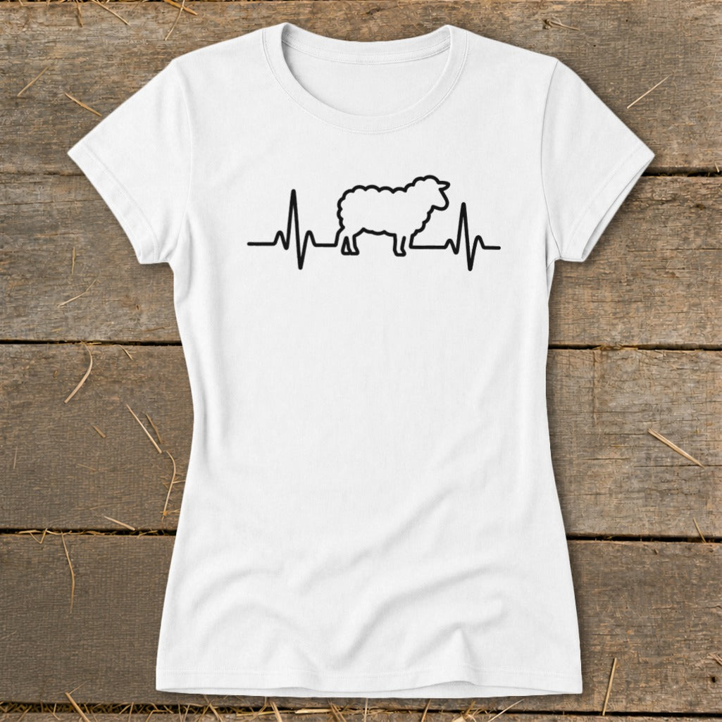 A white women's t-shirt featuring a black graphic of a sheep integrated into a heartbeat line.