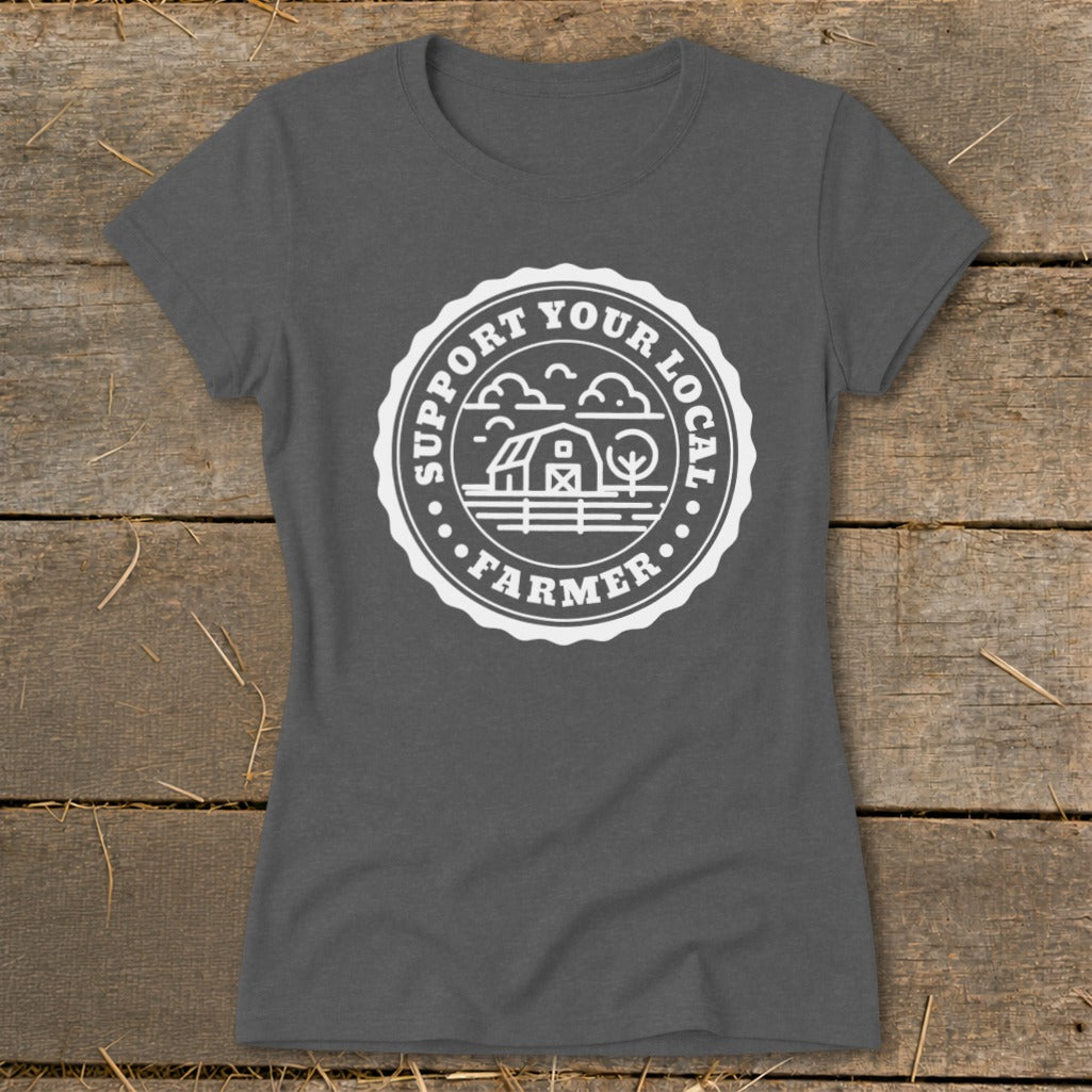 Grey t-shirt with white circular graphic reading "SUPPORT YOUR LOCAL FARMER" and a barn illustration.