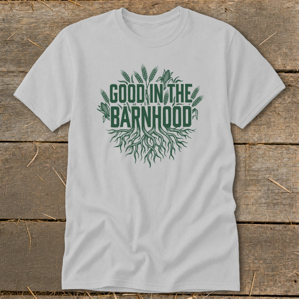 Light grey t-shirt with green "GOOD IN THE BARNHOOD" text and root graphic.