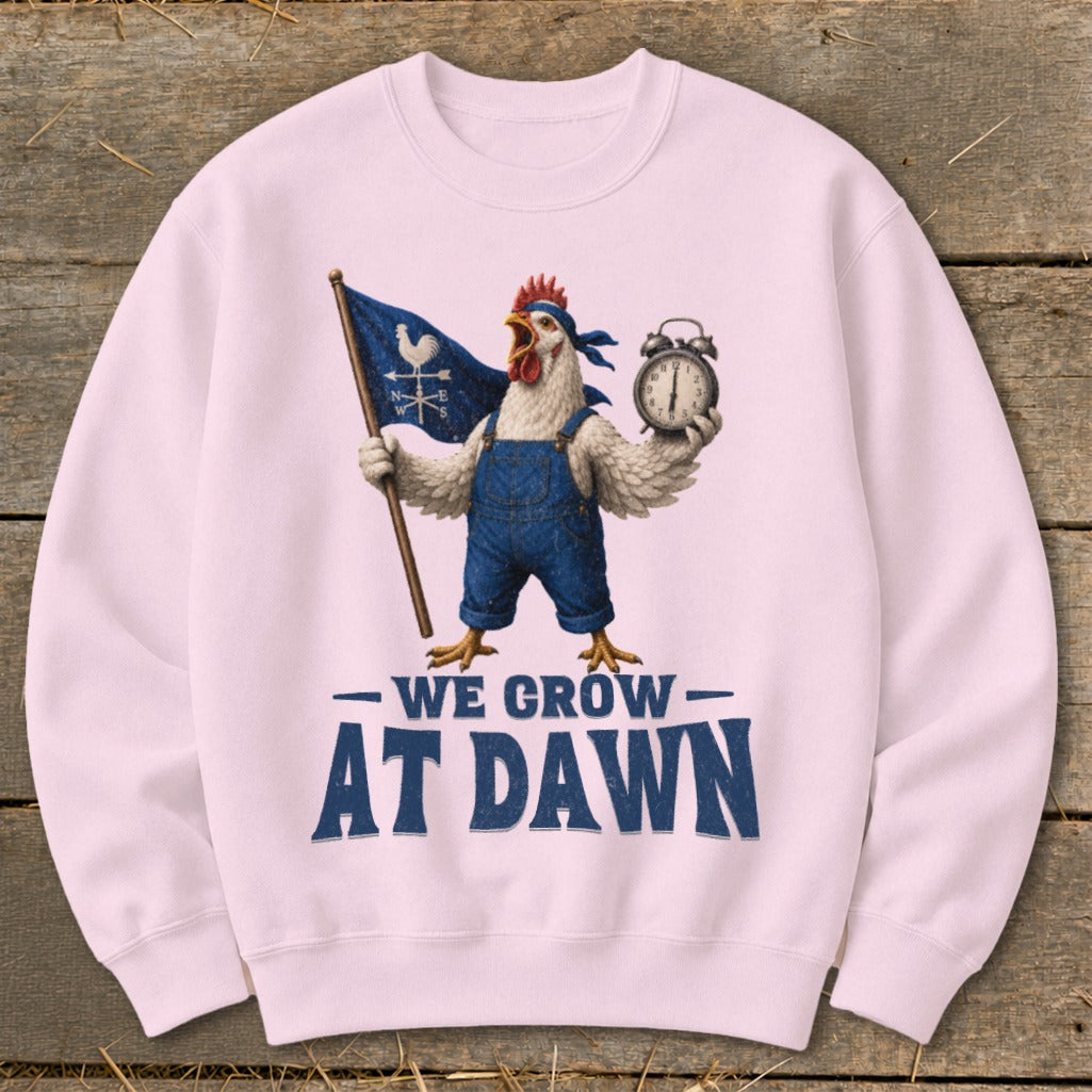 Pink sweatshirt with chicken holding flag and alarm clock, reads "We Grow At Dawn".