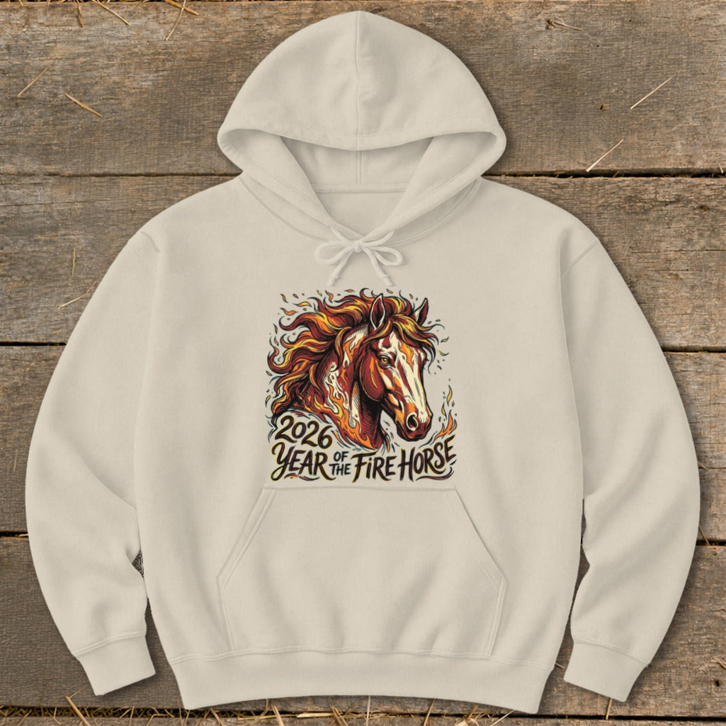 Cream hoodie with a graphic of a horse head surrounded by flames and text "2026 Year of the Fire Horse".