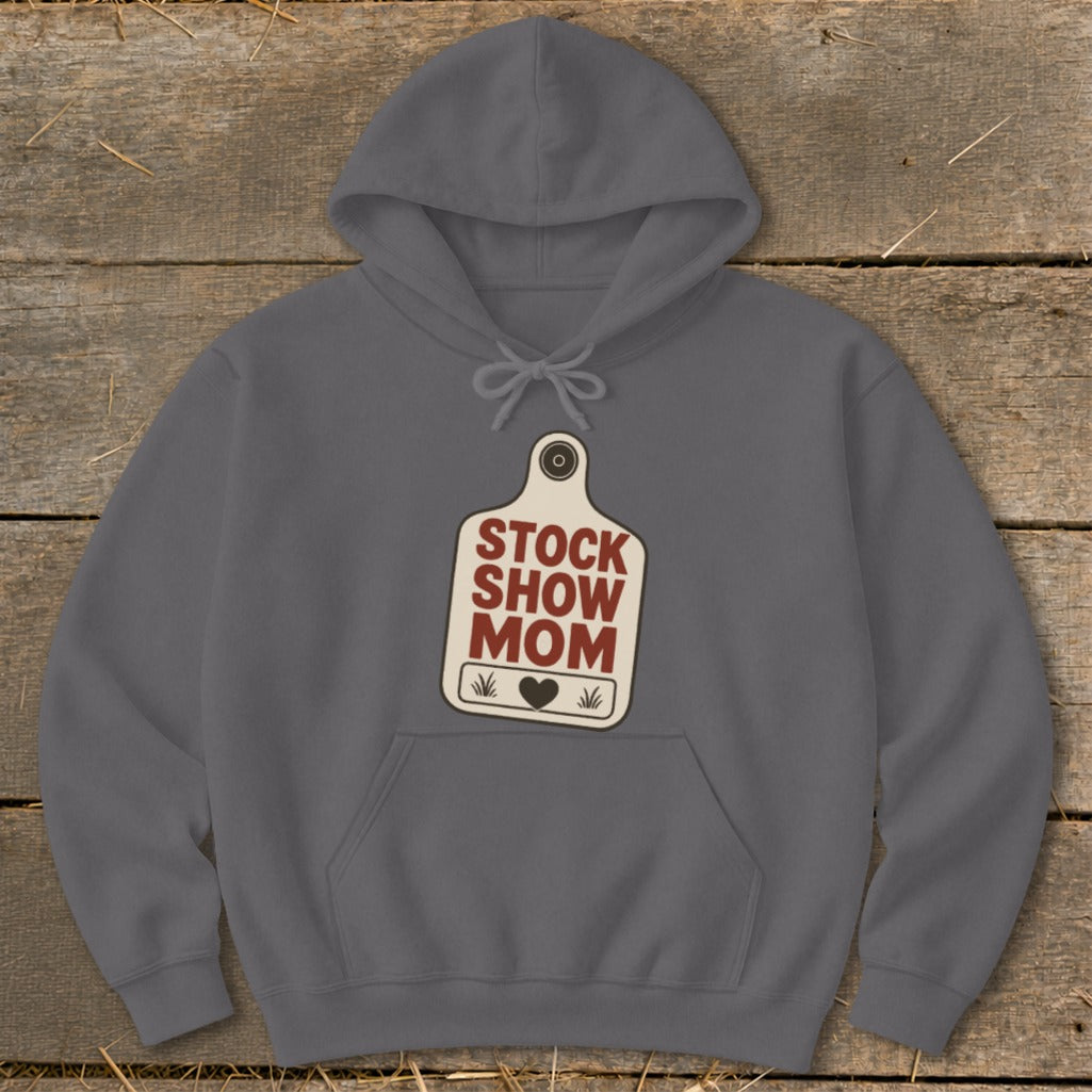 Grey hoodie with a cream-colored tag graphic that reads "STOCK SHOW MOM".
