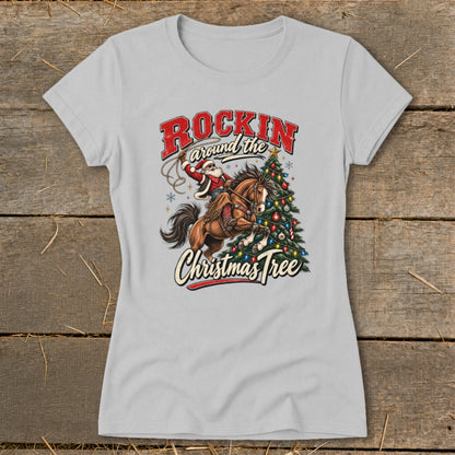 Santa on horseback lassoing a Christmas tree, "Rockin' Around the Christmas Tree" text.