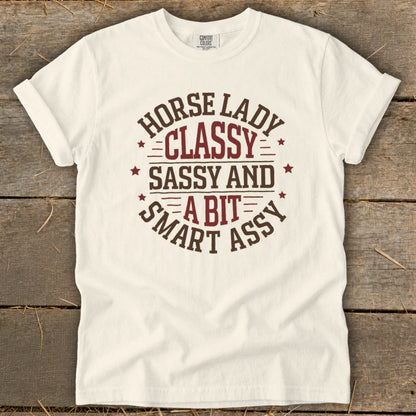 White t-shirt with "Horse Lady Classy Sassy and a Bit Smart Assy" text design.