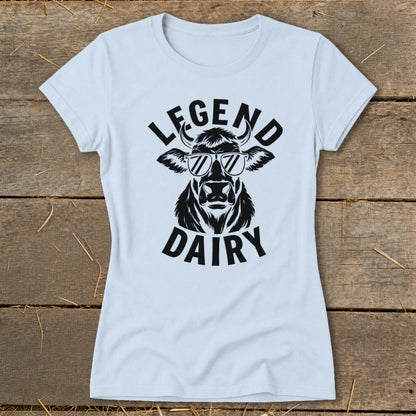 Light blue t-shirt with black graphic of a cow wearing sunglasses and the words LEGEND DAIRY.