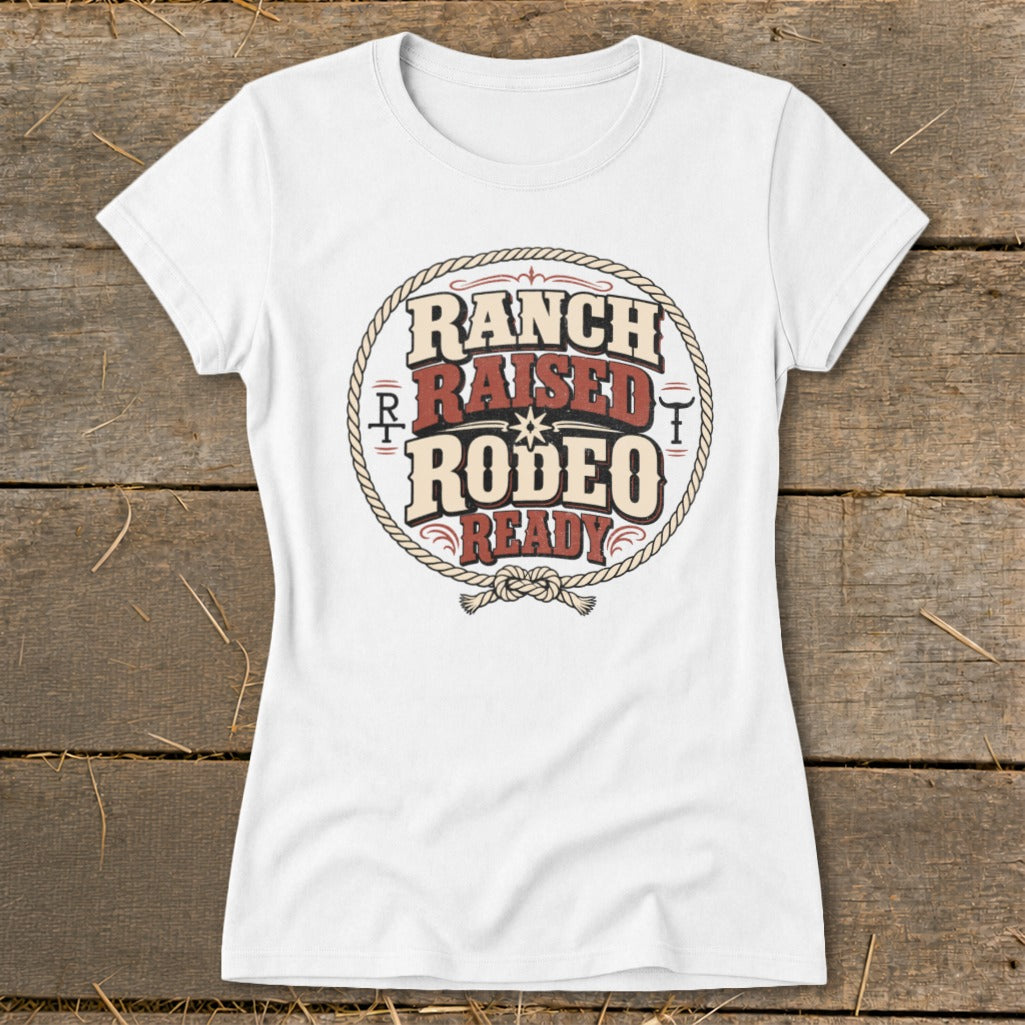 White t-shirt with "Ranch Raised Rodeo Ready" text inside a rope circle.