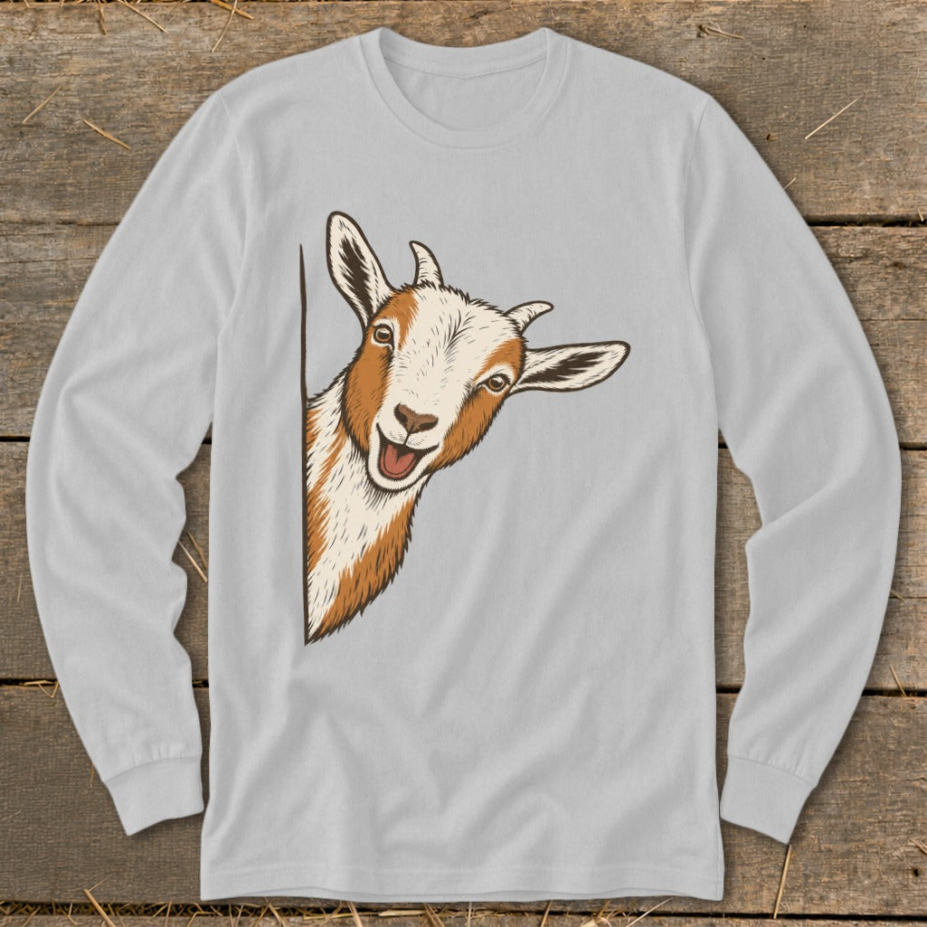 Cartoon goat peeking around a corner with a happy expression on a grey long-sleeve shirt.