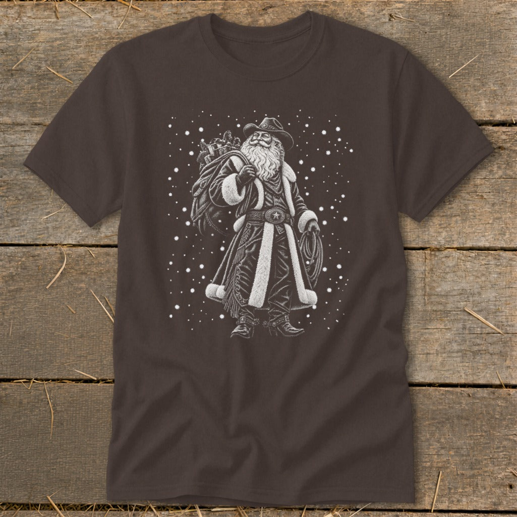 Cowboy Santa holding a sack of gifts and a lasso, with snowflakes.