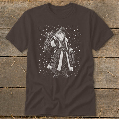 Cowboy Santa holding a sack of gifts and a lasso, with snowflakes.