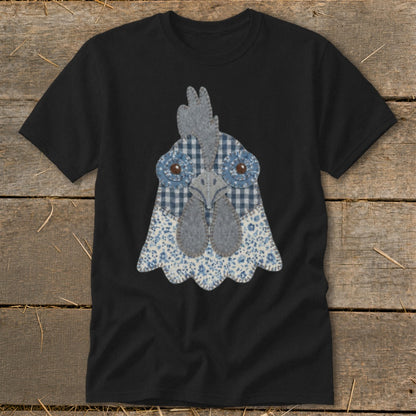 Black t-shirt with a fabric applique of a chicken's head in blue and white patterns.