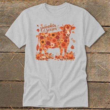 Cow covered in autumnal flowers with "Pumpkin Season" text above.