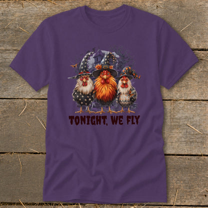 Three chickens in witch hats with "TONIGHT, WE FLY" text.