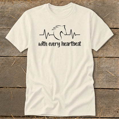 Cream t-shirt with a black horse head integrated into a heartbeat line and text "with every heartbeat".