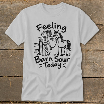 T-shirt with cartoon girl and horse graphic, text "Feeling Barn Sour Today."