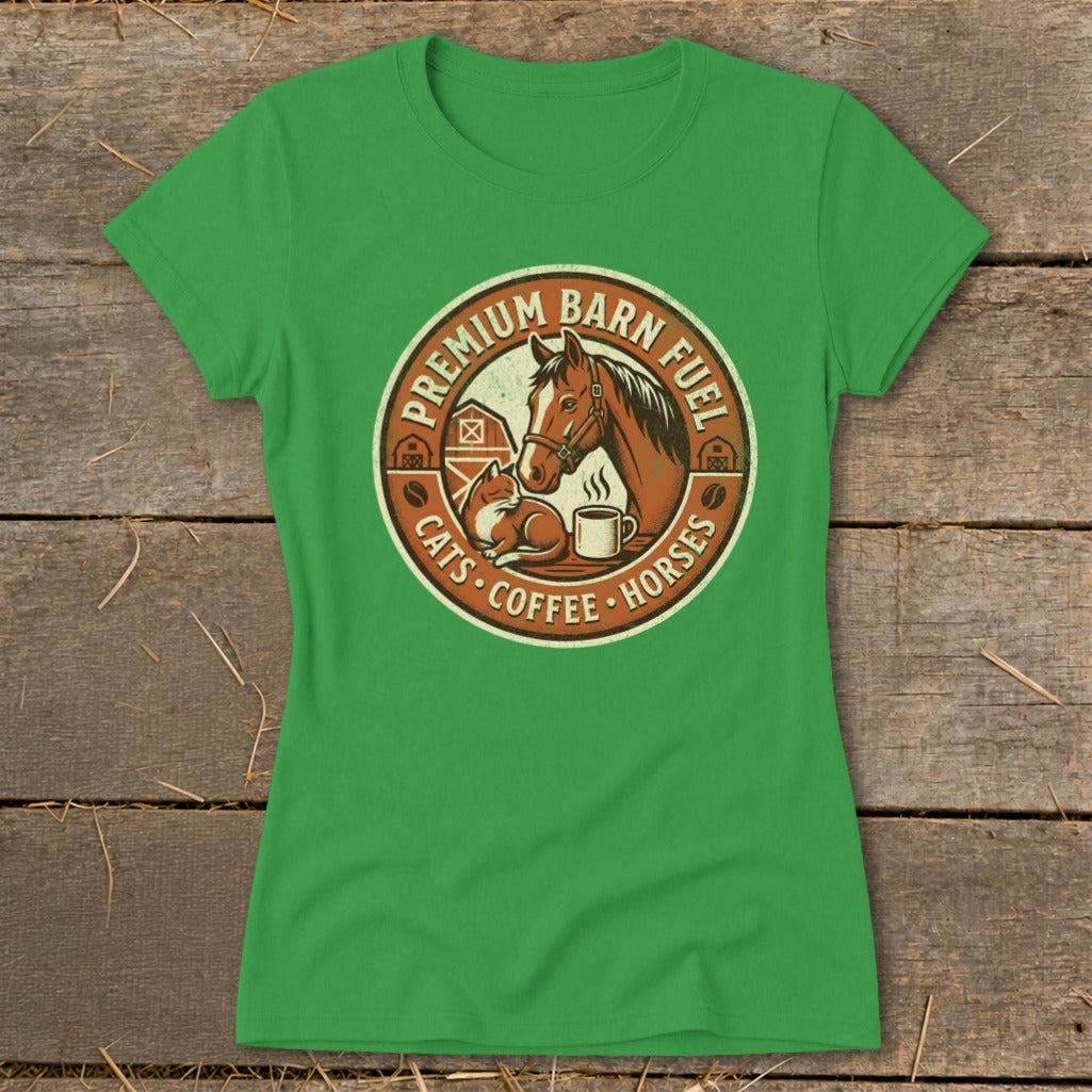 Green t-shirt with circular barn logo featuring horse, cat, coffee, and text.