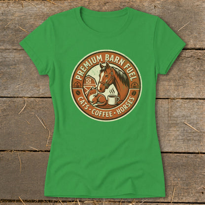 Green t-shirt with circular barn logo featuring horse, cat, coffee, and text.