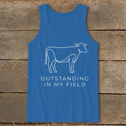 Blue tank top with white outline of a cow and text "OUTSTANDING IN MY FIELD".