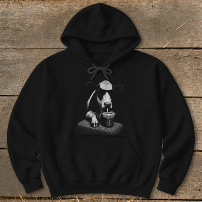 Black hoodie with a cow wearing sunglasses and drinking from a cup.