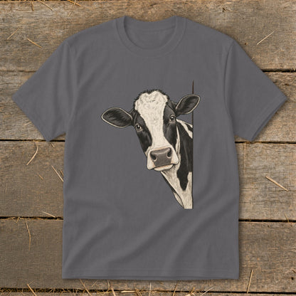 Illustration of a black and white cow peeking from behind a gray t-shirt.