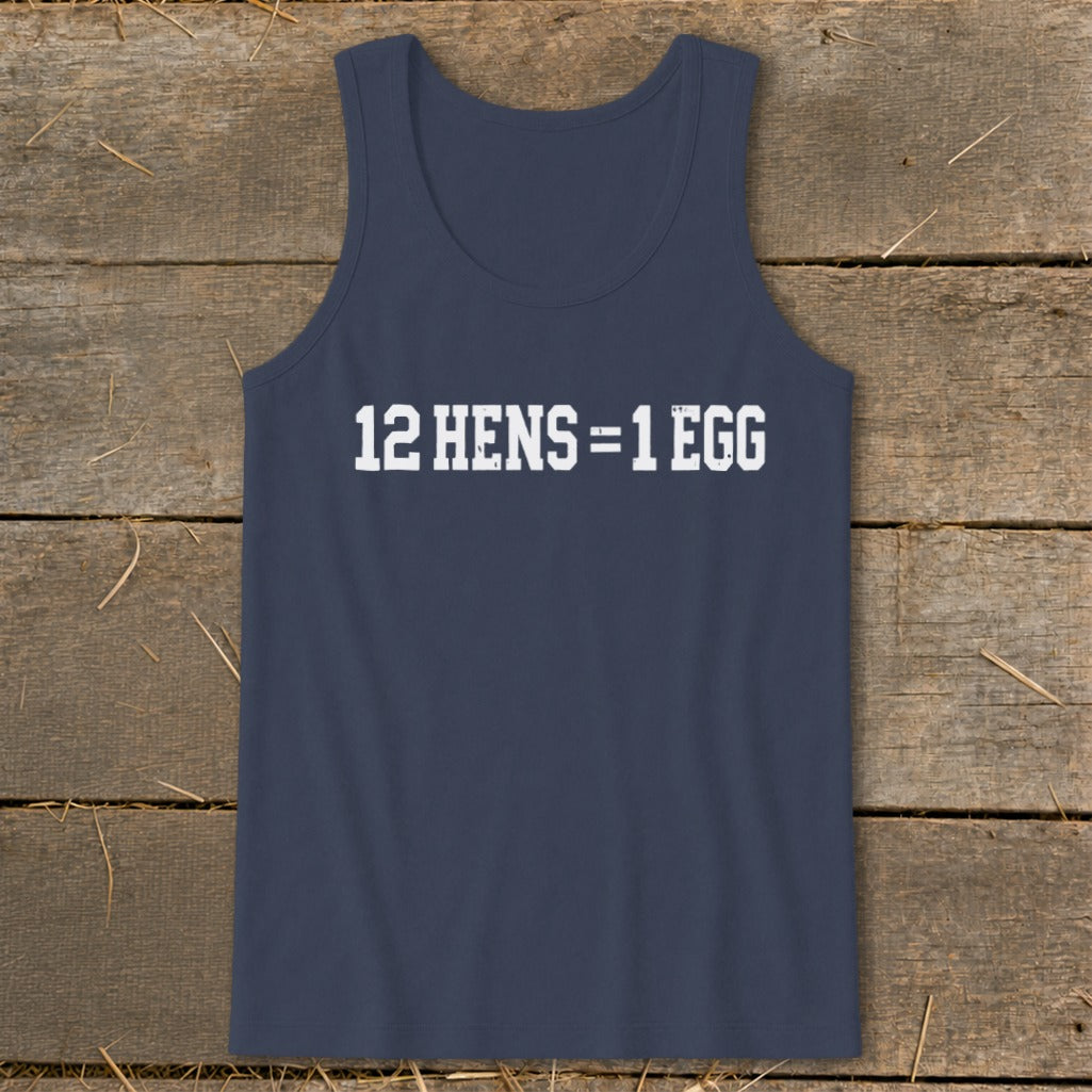 Dark blue men's tank top featuring the white text 12 HENS = 1 EGG displayed centrally on a wooden background.